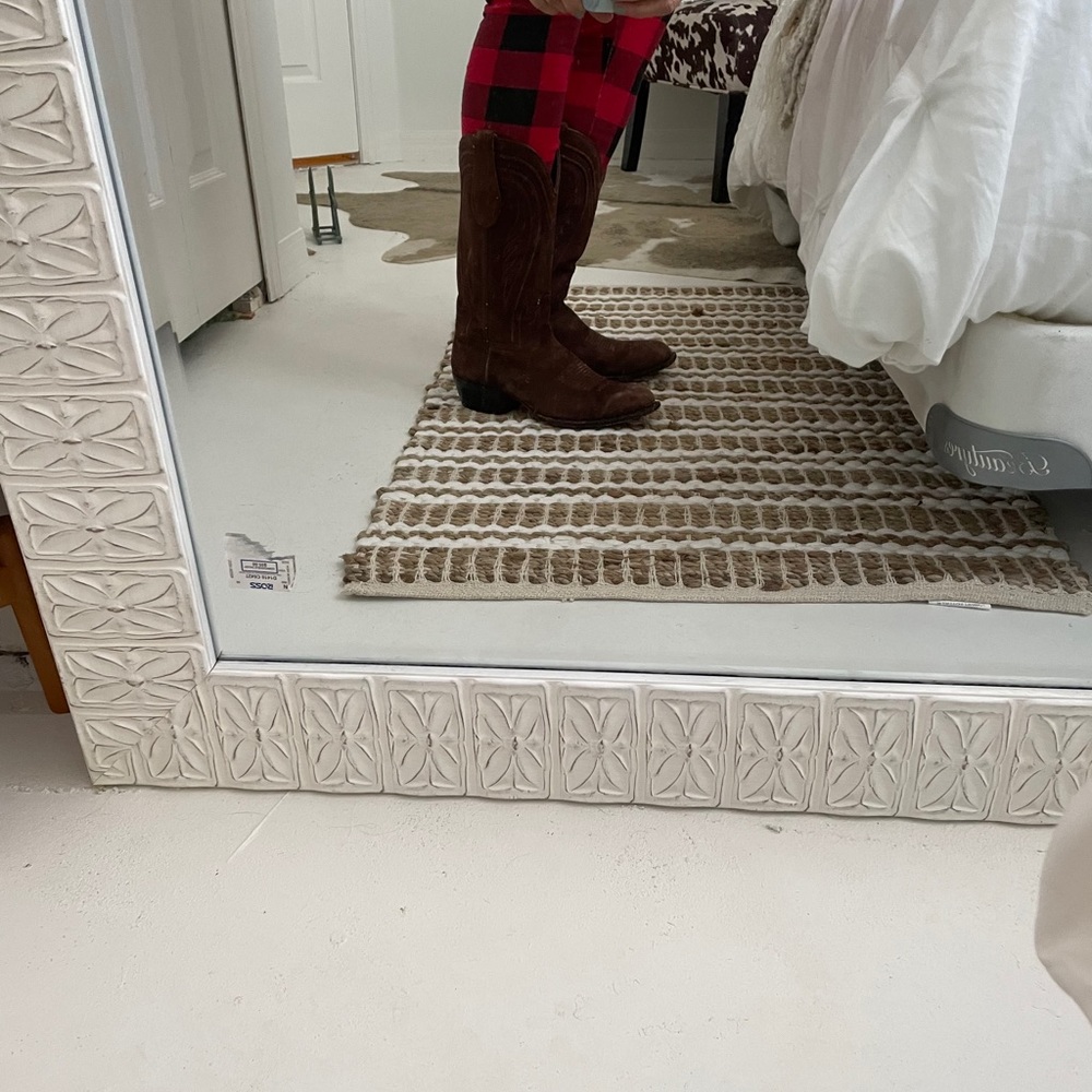 Brown cowhide leather boots.